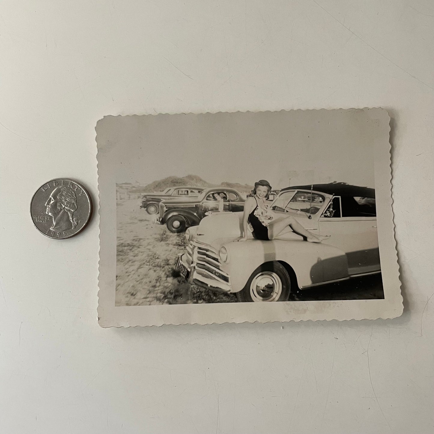 Young Woman Posing on Car Hood, Snapshot, 1940s