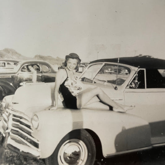 Young Woman Posing on Car Hood, Snapshot, 1940s