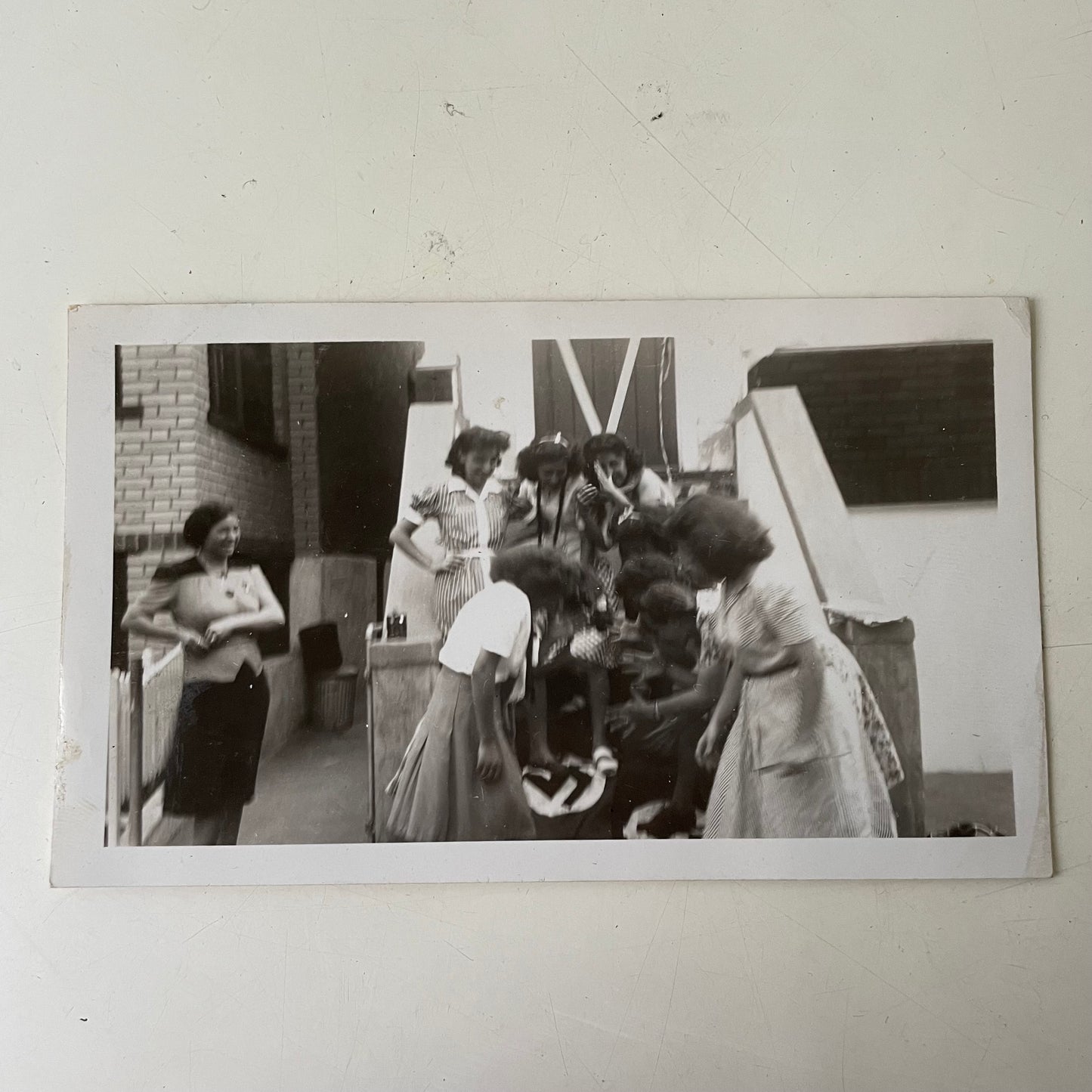 Young Women Stomping on Nazi Flag, Snapshot, 1940s