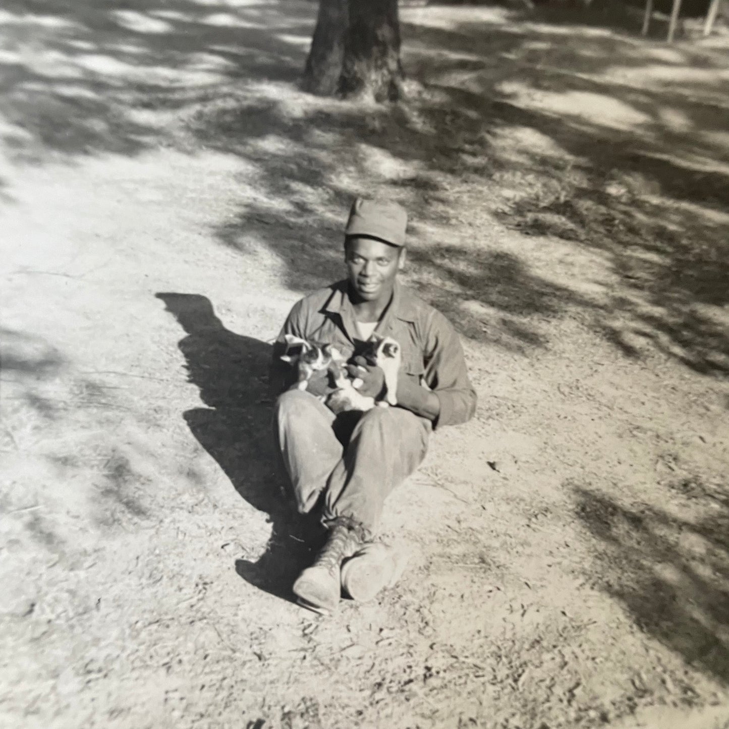 Snapshots, 1940s-- Black Soldier Holding Gun and Kittens