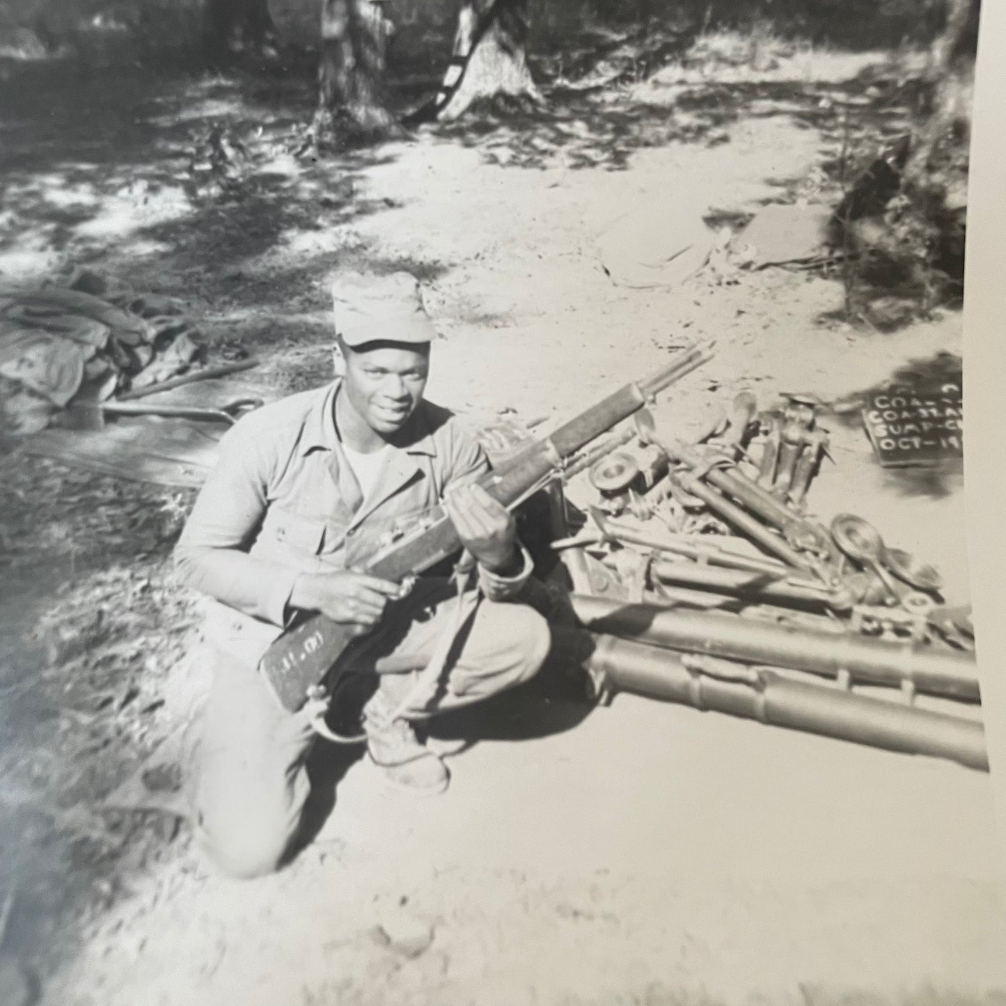 Snapshots, 1940s-- Black Soldier Holding Gun and Kittens